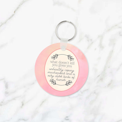 What Doesn't Kill You Dark Humor Keychain